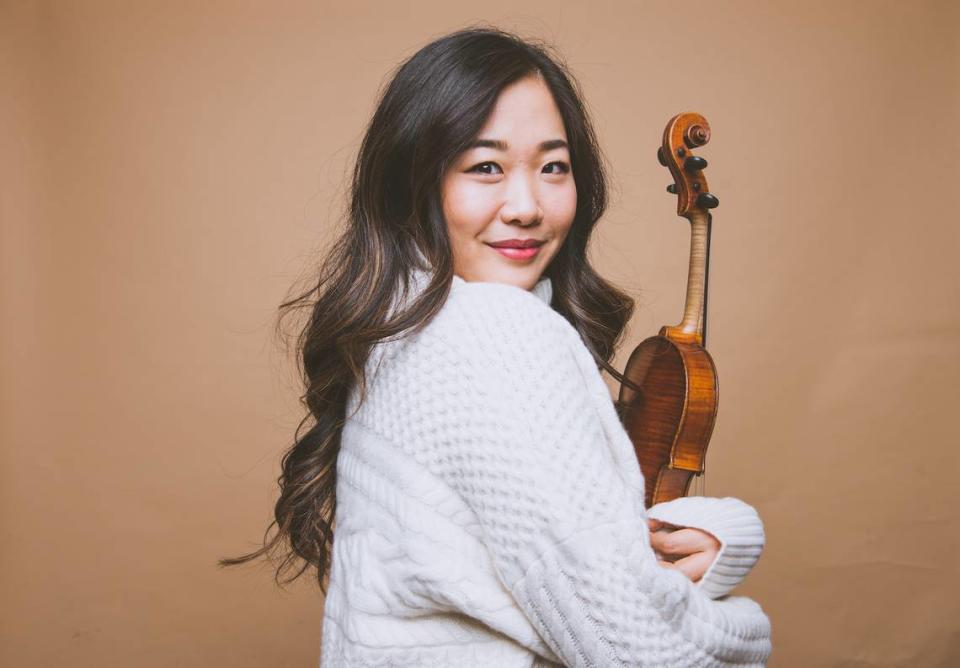Violinist Kristin Lee, the artistic director of Olympia’s Emerald City Music, will play Tchaikovsky’s Violin Concert with the Olympia Symphony Orchestra at its Sunday, March 17, “Pride” concert. Lauren Desberg/Courtesy of Olympia Symphony Orchestra