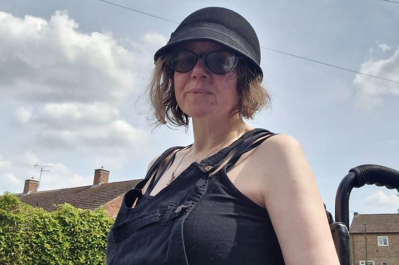 Woman in wheelchair, who has had to move back to England because she could not afford suitable accommodation to rent. Emma Stapleton, who lives with a disability could not find accommodation in Cardiff which was both accessible and affordable for her.