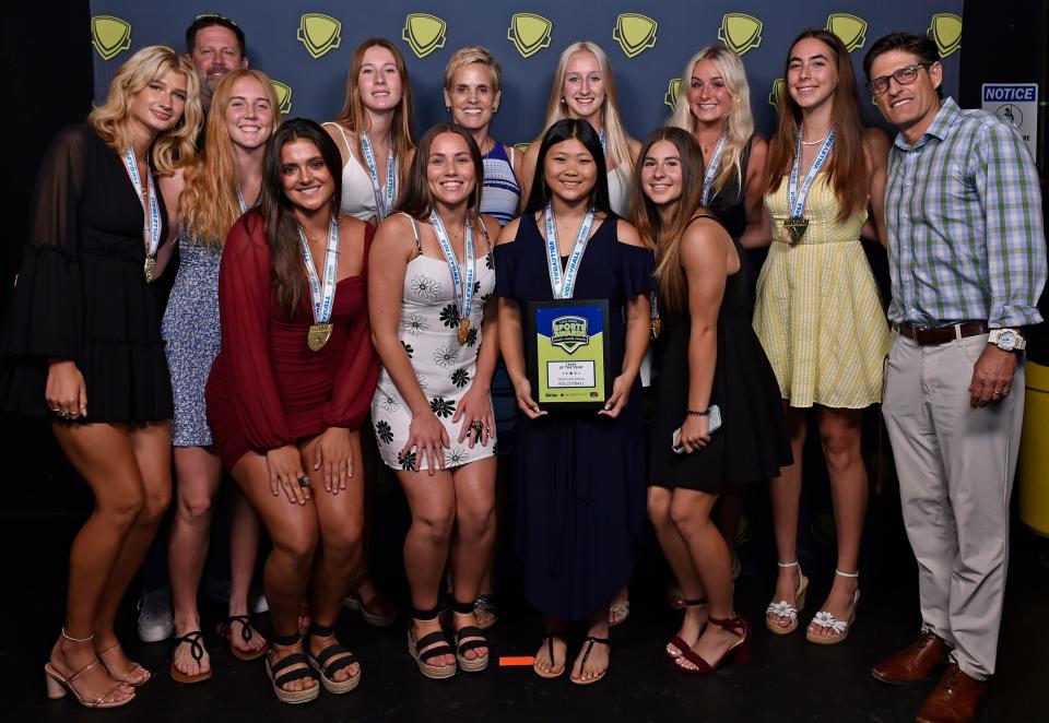 Brian Wheatley, far right, Venice High School volleyball Coach of the Year with his team and 12-time Olympic medalist Dara Torres.