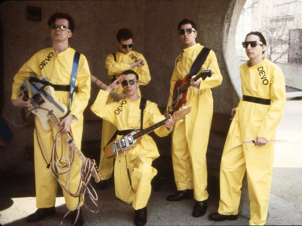 The Akron band Devo, from left, Mark Mothersbaugh, Bob Mothersbaugh, kneeling, Jerry Casale, Bob Casale  and Alan Myers, pose for a photo in 1978.