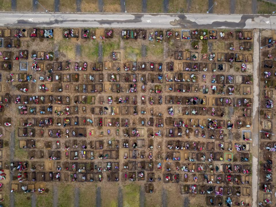 This photo shows fresh graves at the Butovskoye cemetery, which serves as one of burial grounds for those who died of the coronavirus, in Moscow, Russia. The way Russia counts fatalities during the coronavirus pandemic could be one reason why its official death toll is far below many other countries, even as it has reported at least 511,000 infections, behind only the United States and Brazil. (AP Photo/Dmitry Serebryakov)