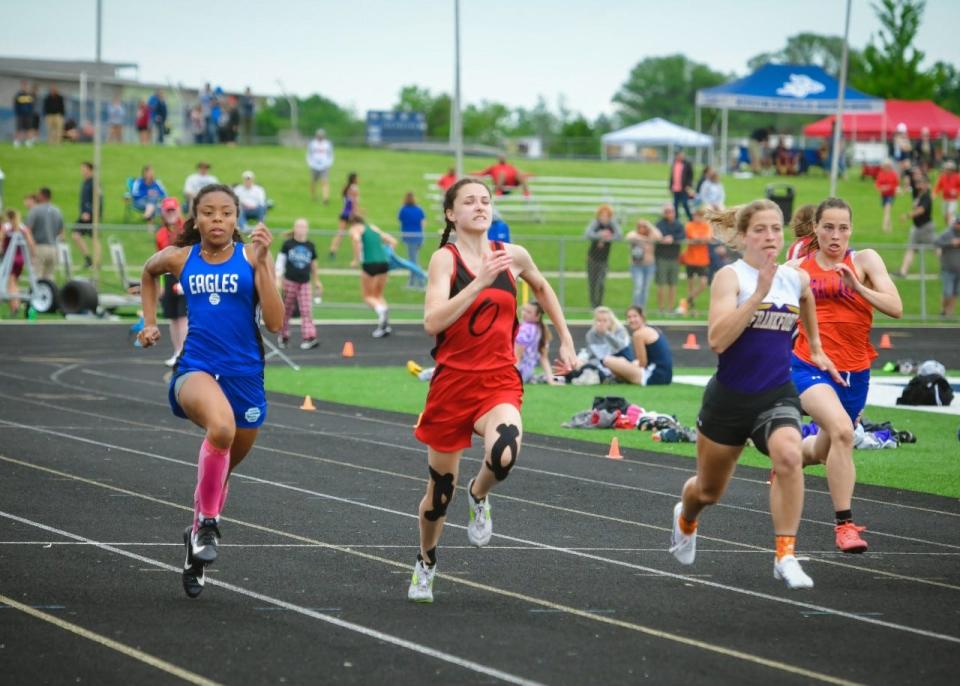 Onaway's Madilyn Crull (second from left) finished runner-up in the girls 100 at the recent Division 4 state finals.