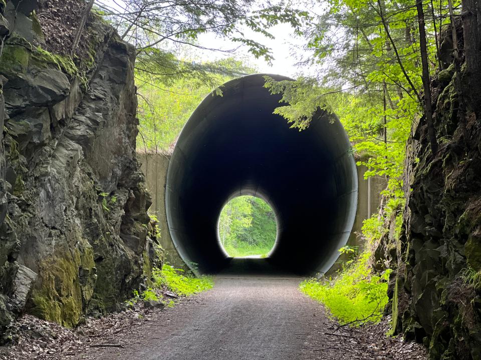 One of the highlights of the 14.1 mile section of the Lamoille Valley Rail Trail between West Danville and St. Johnsbury is this tunnel you can ride through. It seems to come out of nowhere, is longer than it seems, and is great for experimenting with echoes. Pictured on June 11, 2023.