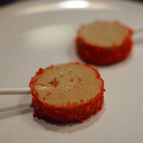 Foie gras lollipop coated with pop rocks candy