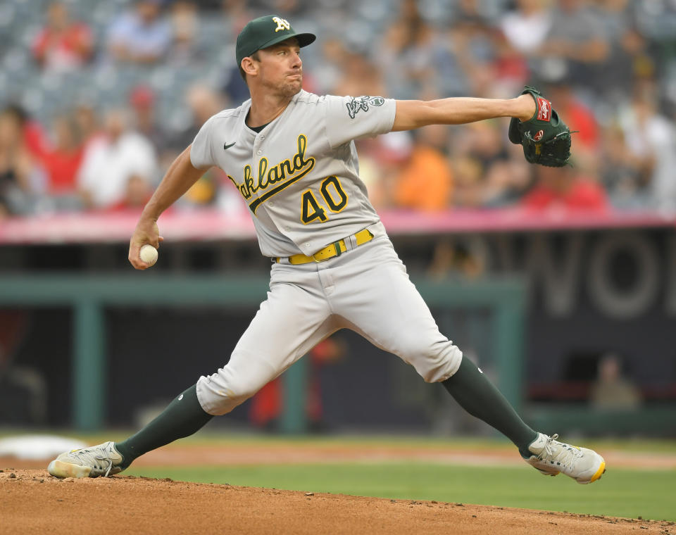 Oakland Athletics starting pitcher Chris Bassitt throws during the first inning of the team's baseball game against the Los Angeles Angels on Friday, July 30, 2021, in Anaheim, Calif. (AP Photo/John McCoy)