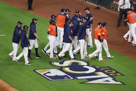 Oct 13, 2017; Houston, TX, USA; Houston Astros players celebrate in the ninth inning during game one of the 2017 ALCS playoff baseball series against the New York Yankees at Minute Maid Park. Mandatory Credit: Thomas B. Shea-USA TODAY Sports