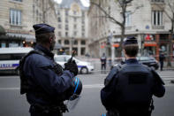 French police stand in front of the French financial prosecutor's offices following a bomb alert in central Paris, France, March 20, 2017. REUTERS/Benoit Tessier