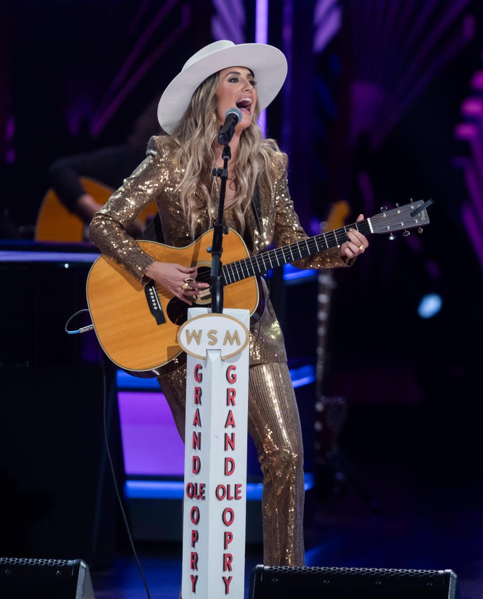 Lainey Wilson performs at the Grand Ole Opry prior to being officially inducted as an Opry member Friday, June 7, 2024.