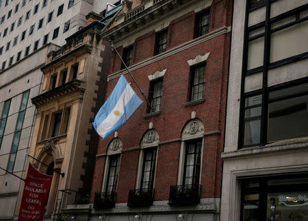 The flag hangs at half mast at the Argentine Consulate, in honour of the five Argentine citizens who were killed in the truck attack in New York on October 31, in New York City, U.S., November 2, 2017. REUTERS/Brendan McDermid