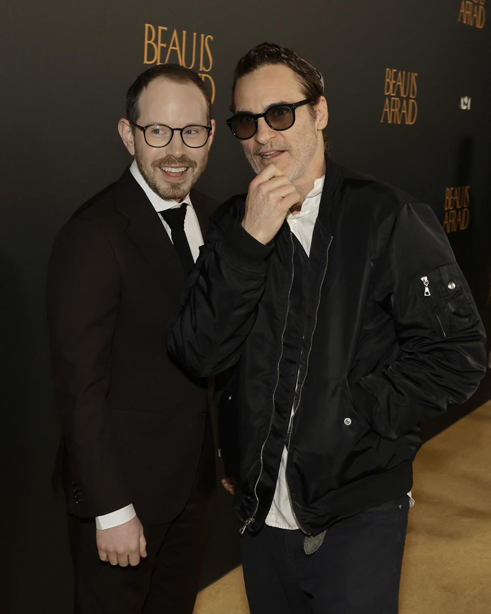 (L-R) Ari Aster and Joaquin Phoenix attend the Los Angeles premiere of A24's "Beau Is Afraid" at the Directors Guild of America on April 10, 2023 in Los Angeles, California.