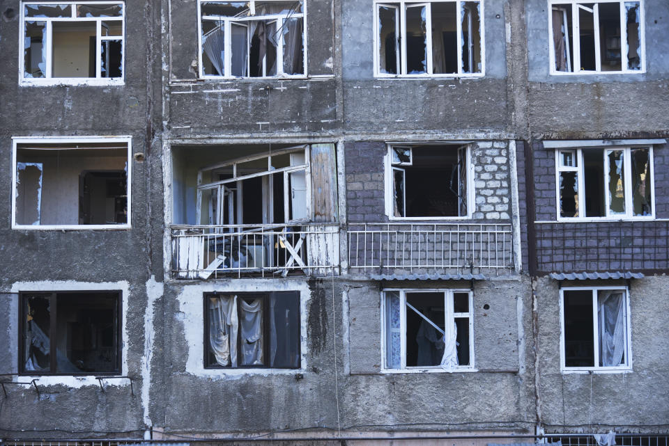 A residential area that were allegedly damaged by shelling is seen during a military conflict in self-proclaimed Republic of Nagorno-Karabakh, Stepanakert, Azerbaijan, Saturday, Oct. 3, 2020. The fighting is the biggest escalation in years in the decades-long dispute over the region, which lies within Azerbaijan but is controlled by local ethnic Armenian forces backed by Armenia. (David Ghahramanyan/NKR InfoCenter PAN Photo via AP)