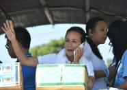 Philippine presidential candidate Grace Poe greets supporters during a campaign rally in Dasmarinas, Cavite province, on May 3, 2016