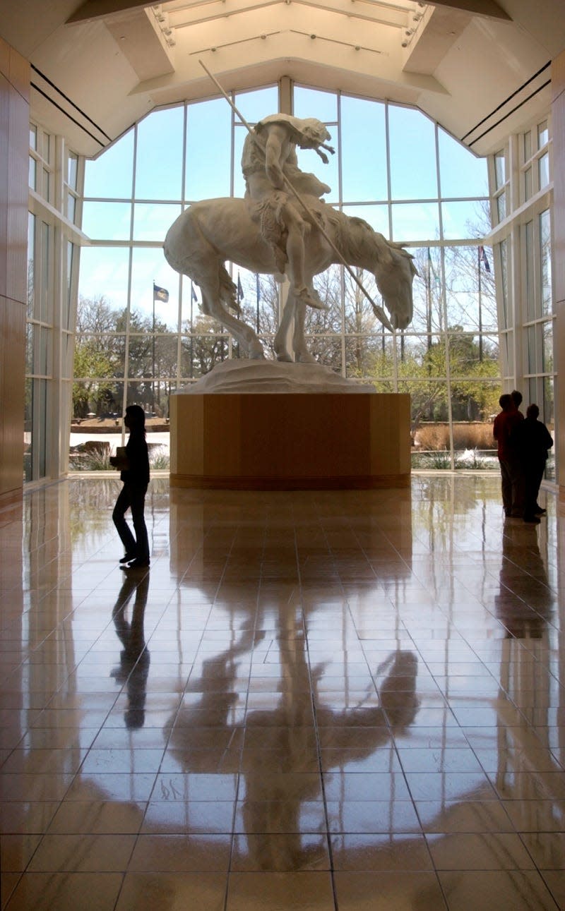 James Earle Fraser's massive "The End of the Trail" statue greets visitors at the entrance of the National Cowboy & Western Heritage Museum.