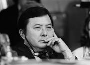 Sen. Daniel K. Inouye (D-Hawaii), with his glasses around his neck listens to testimony from L. Patrick Gray III, former acting director of the Federal Bureau of Investigation, before questioning Gray before the Senate Watergate committee, Aug. 6, 1973 in Washington. (AP Photo)
