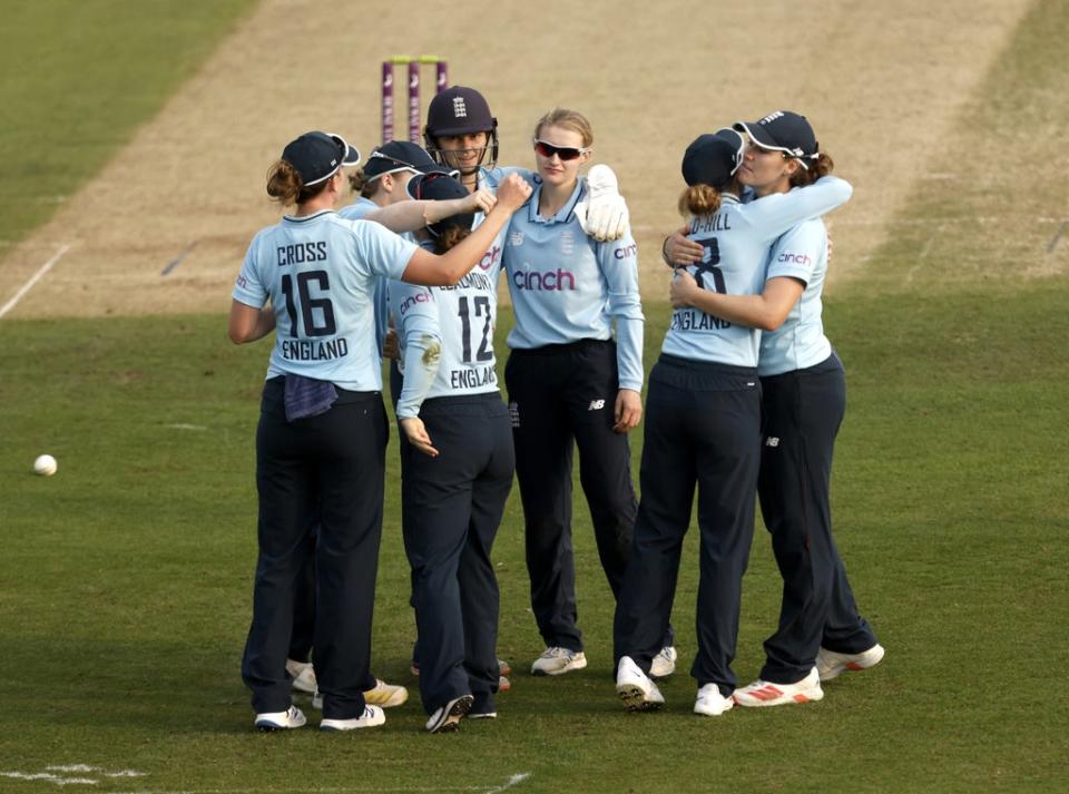 England’s Charlie Dean and Tammy Beaumont celebrate with their team-mates (Steven Paston/PA) (PA Wire)