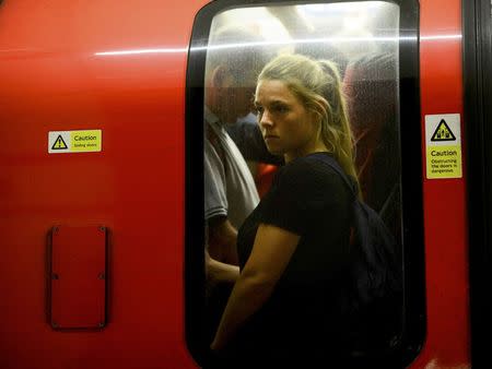 Commuters brave rush hour on the northern line on the London underground in London, Britain August 5, 2015. REUTERS/Dylan Martinez