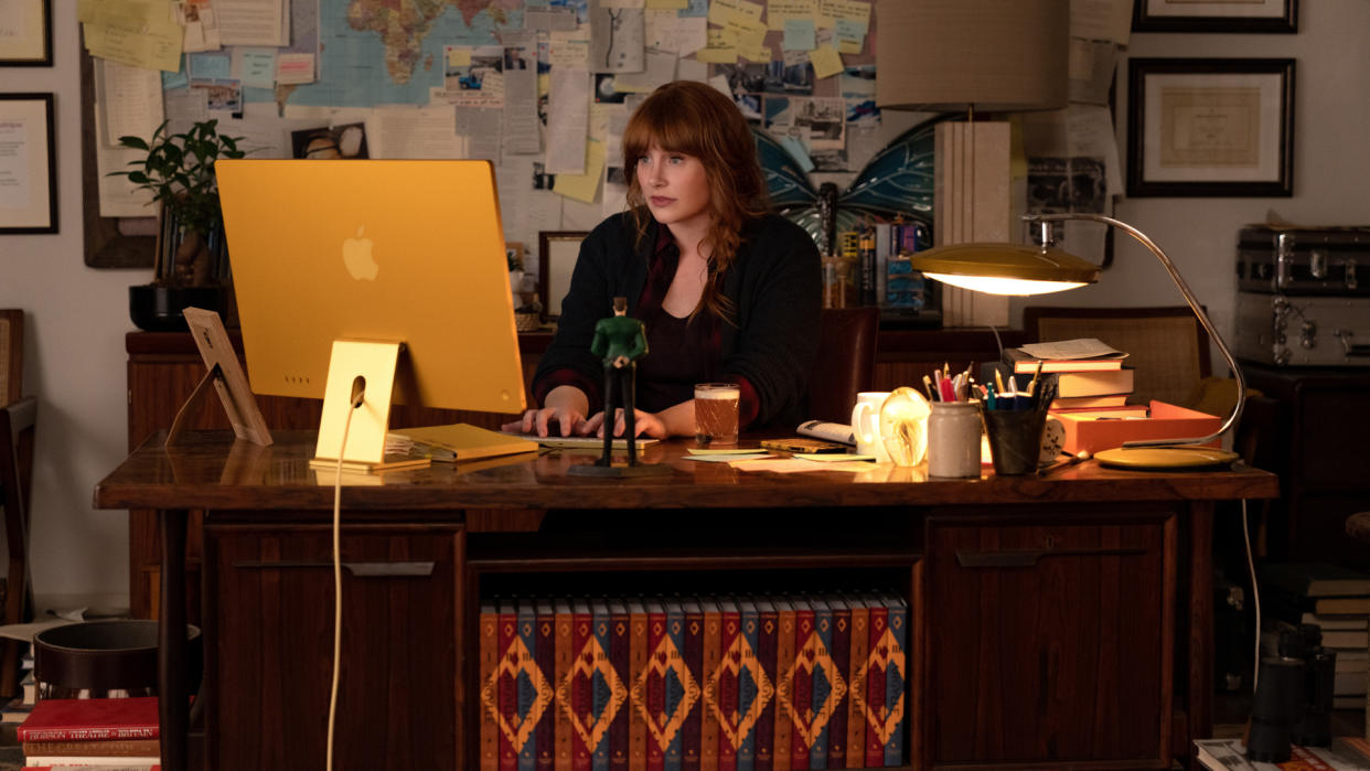  Elly Conway sits at her computer in Apple and Universal's Argylle movie. 