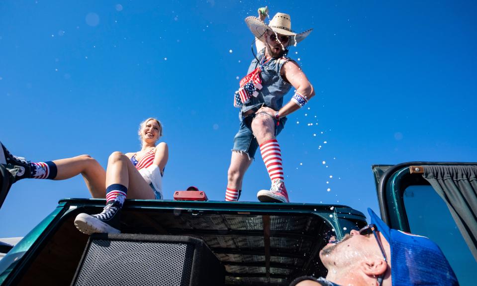 Racing fans gather at Snake Pit on Saturday, May 28, 2022, during the 106th running of the Indianapolis 500 at Indianapolis Motor Speedway.