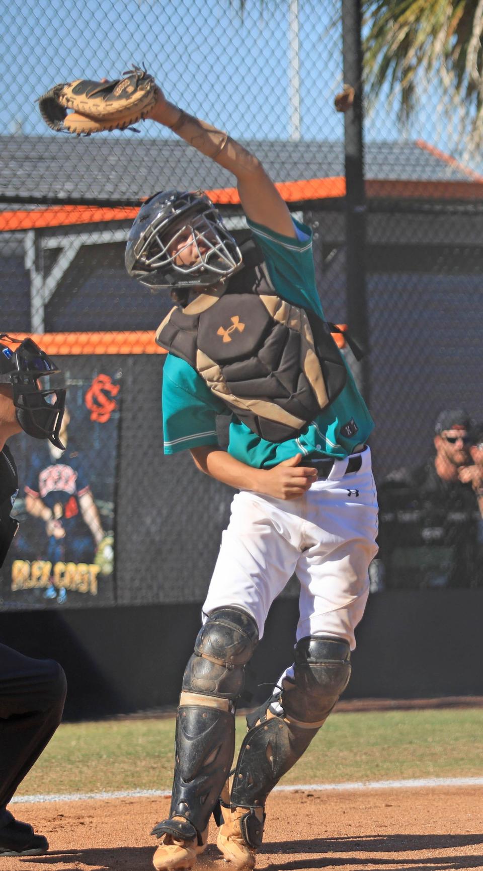 Pine Ridge’s Tommy Soltysiak (14) reaches up to catch the ball during a Five Star Conference baseball quarterfinal against Deltona on Saturday, April 13, 2024 at Spruce Creek High School.