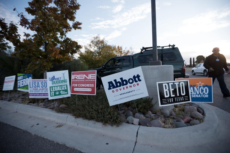 Campaign signs are shown outside the El Paso County Tax Office-Eastside Annex voting site on Election Day for the 2022 midterm election.