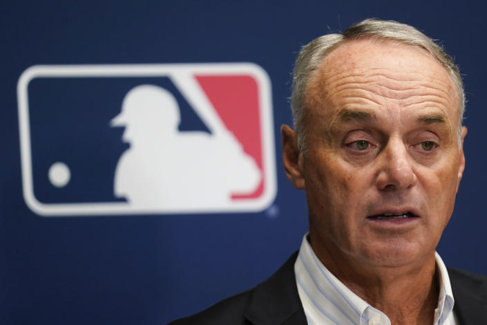 FILE - Major League Baseball Commissioner Rob Manfred speaks to reporters following an owners' meeting at MLB headquarters in New York, June 16, 2022. MLB said it is prepared to voluntarily accept the formation of a minor league union, a key step that will lead to collective bargaining and possibly a strike threat at the start of next season. Manfred said the sport was in the process of notifying the MLB Players Association, which launched the unionization drive on Aug. 28, 2022. (AP Photo/Seth Wenig, File)