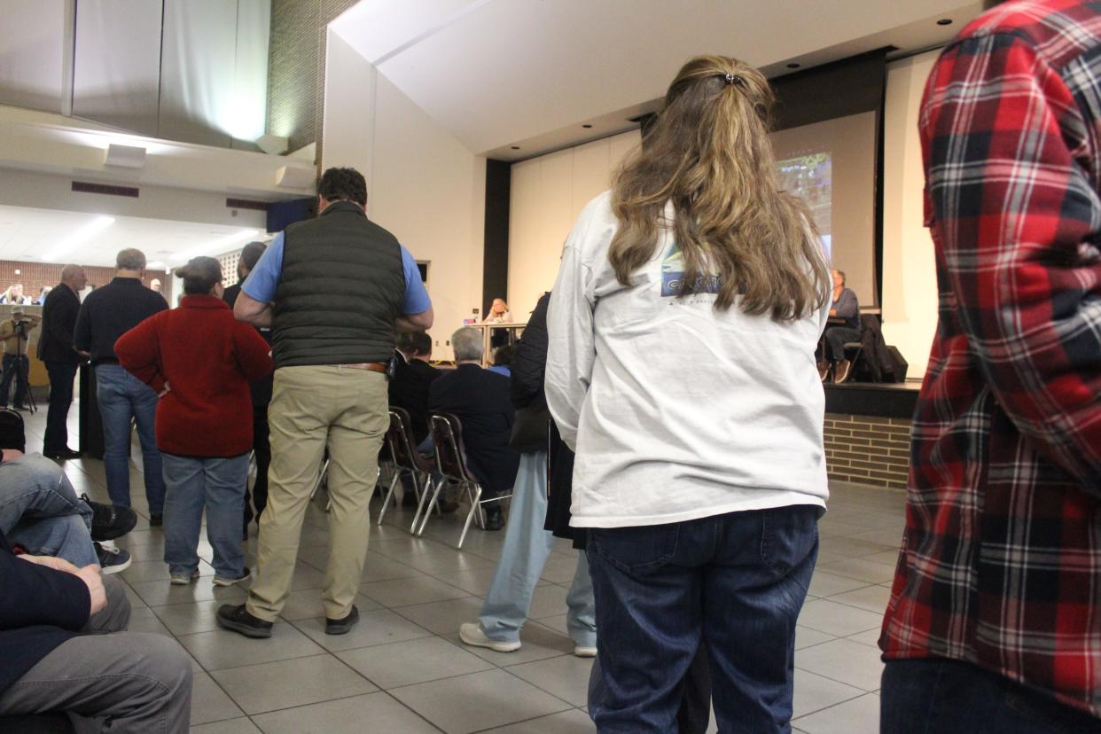 Residents lined up to speak during the Marion Township Board of Trustees special meeting at Parker Middle School on Thursday, Feb. 9, 2023.