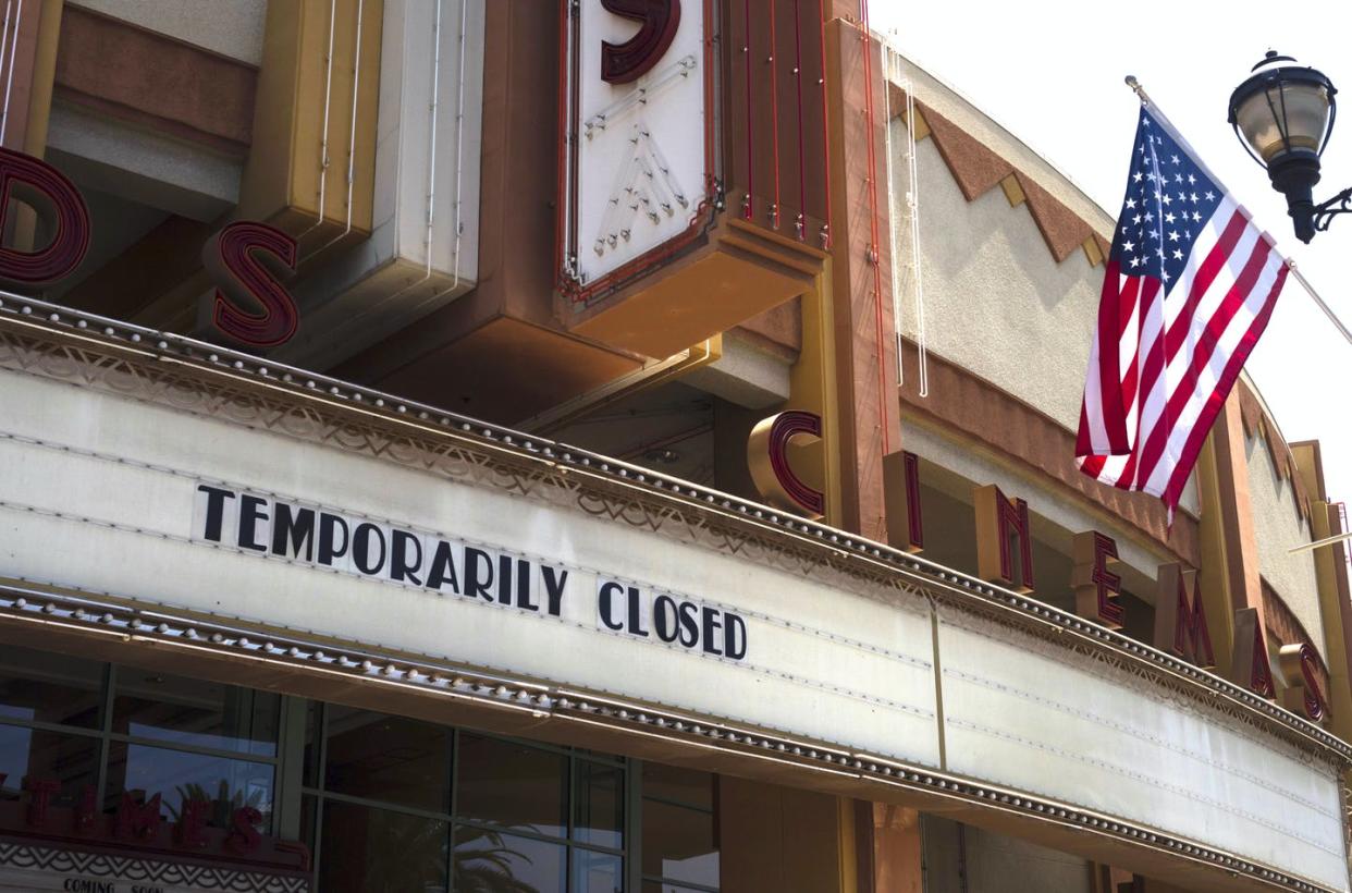 <span class="caption">A movie theater in Brea, Calif., has shuttered its doors due to the coronavirus pandemic.</span> <span class="attribution"><a class="link " href="http://www.apimages.com/metadata/Index/Virus-Outbreak-California/1c5dca1d95774b11936539bf0e20f569/40/0" rel="nofollow noopener" target="_blank" data-ylk="slk:AP Photo/Jae C. Hong;elm:context_link;itc:0;sec:content-canvas">AP Photo/Jae C. Hong</a></span>