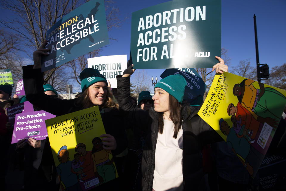 Abortion rights demonstrators rally outside of the U.S. Supreme Court in Washington, Wednesday, March 4, 2020. Among abortion-rights activists, there's relief and optimism as the Biden administration takes power Biden is expected to soon issue executive orders reversing anti-abortion actions taken by Trump. (AP Photo/Jose Luis Magana, File)