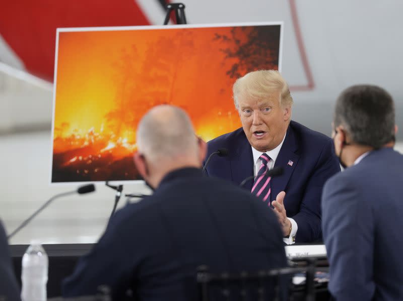 U.S. President Trump participates in a briefing on wildfires in McClellan Park in McClellan Park, California