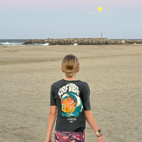 <p>Kristen Bell/Instagram</p> Bell and Shepard's daughter looks out at the full moon