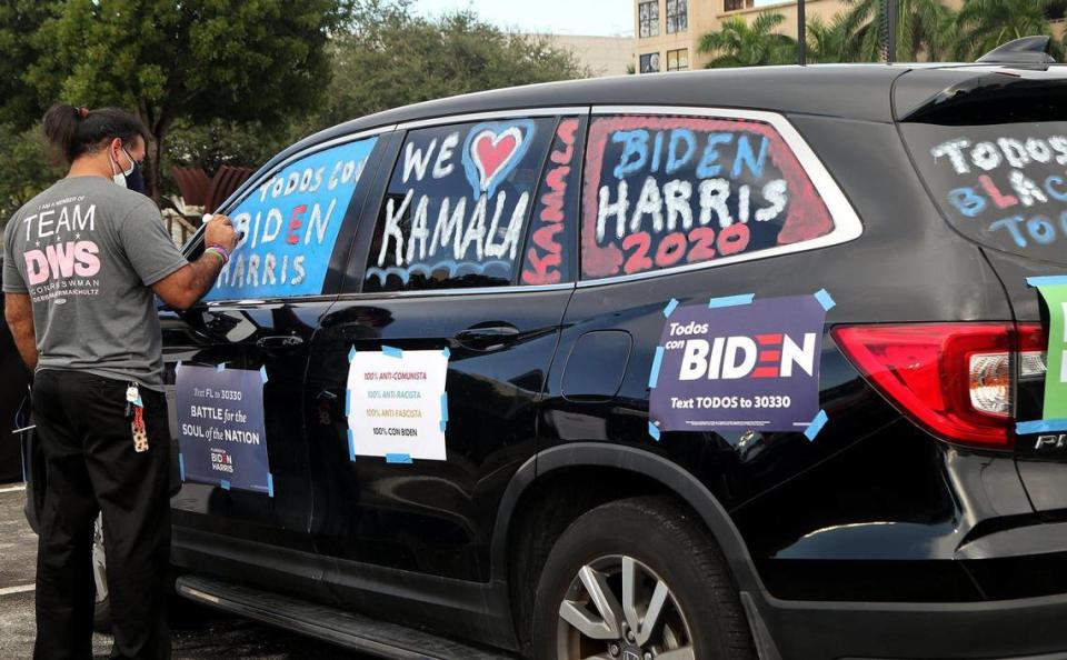 Supporters of VP Joe Biden, gathered around their cars during a drive-in car rally held by U.S. Senator Kamala Harris, running mate of Democratic presidential nominee Joe Biden held at FIU South Campus in Miami as she campaigns ahead of November 3rd Election Day in South Florida on Saturday, October 31, 2020