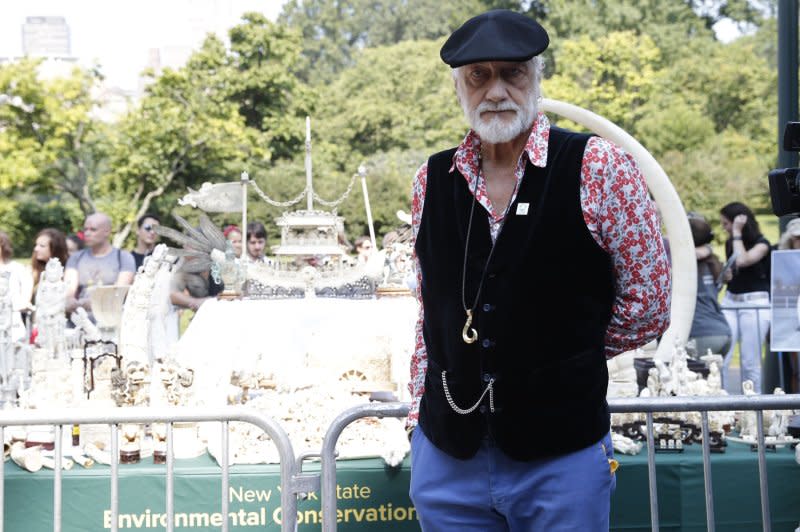 IFAW ambassador Mick Fleetwood stands with illegal ivory trinkets, tusks and creations that are on display along with a ton of illegal ivory before being destroyed as an ode to end the illegal trafficking and brutal mistreatment of elephants in Central Park in 2017 in New York City. File Photo by John Angelillo/UPI