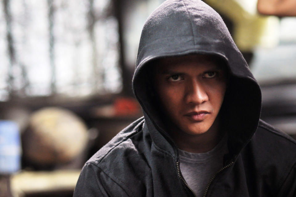 Iko Uwais attempts to be stealthy in "The Raid 2"