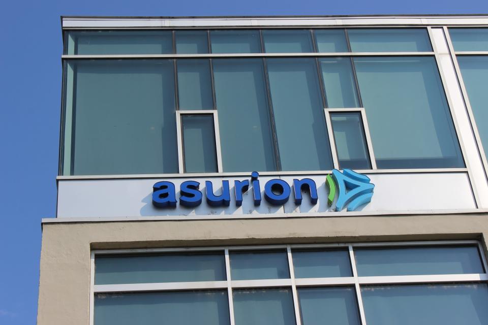 One of the offices of Asurion, a massive phone insurance corporation, is photographed in downtown Nashville on August 13, 2019.  Asurion recently paid a $300,000 ransom to an extortionist who claimed to have stolen employee and customer info.