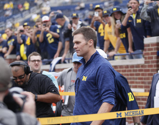 Tom Brady looks miserable, like a guy who has stayed around a year