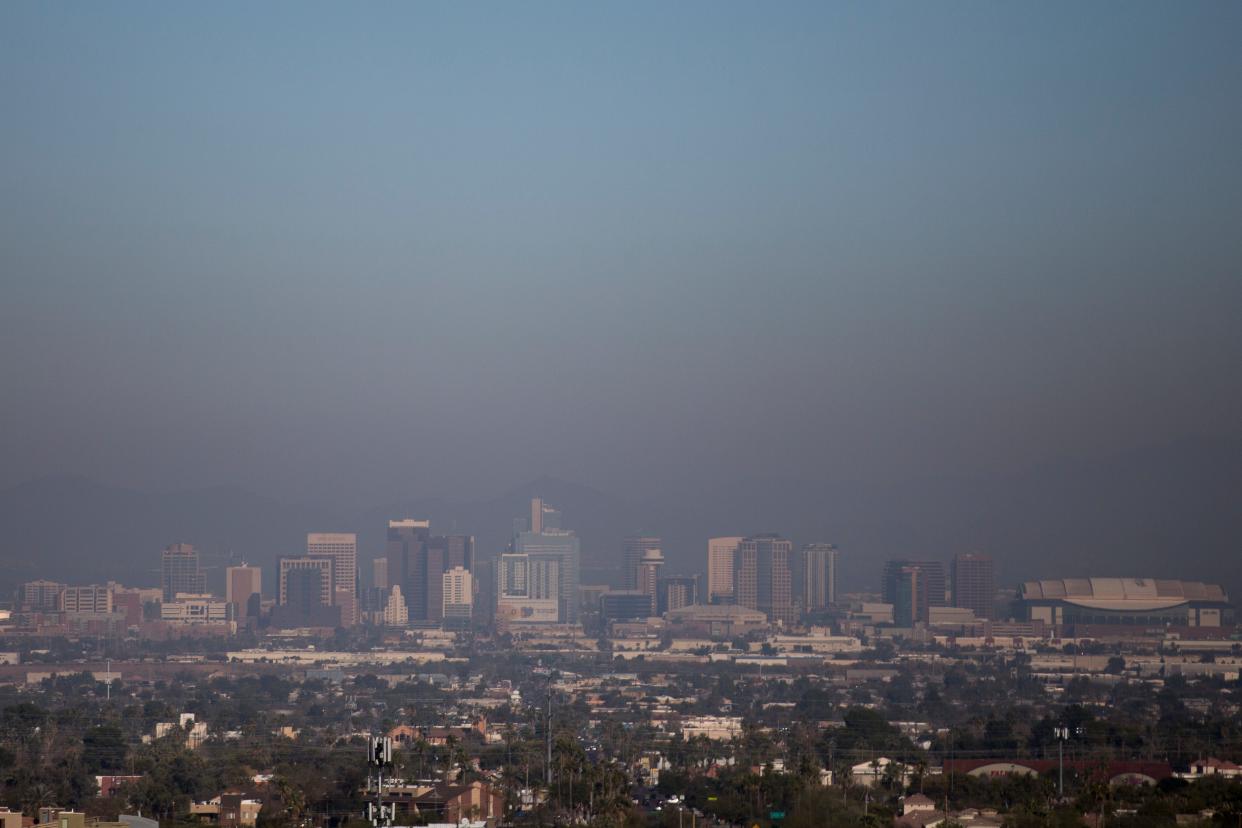 Air pollution is seen over a hazy downtown Phoenix on Jan. 2, 2020. 