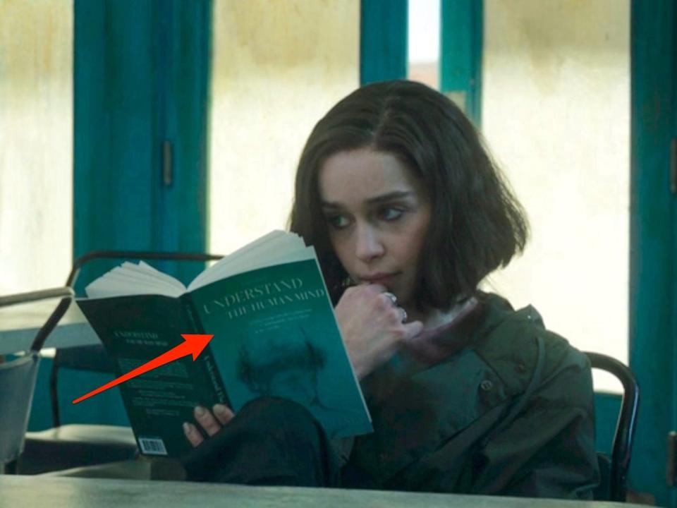 A red arrow pointing to a book G'iah is reading on season one, episode one of "Secret Invasion."