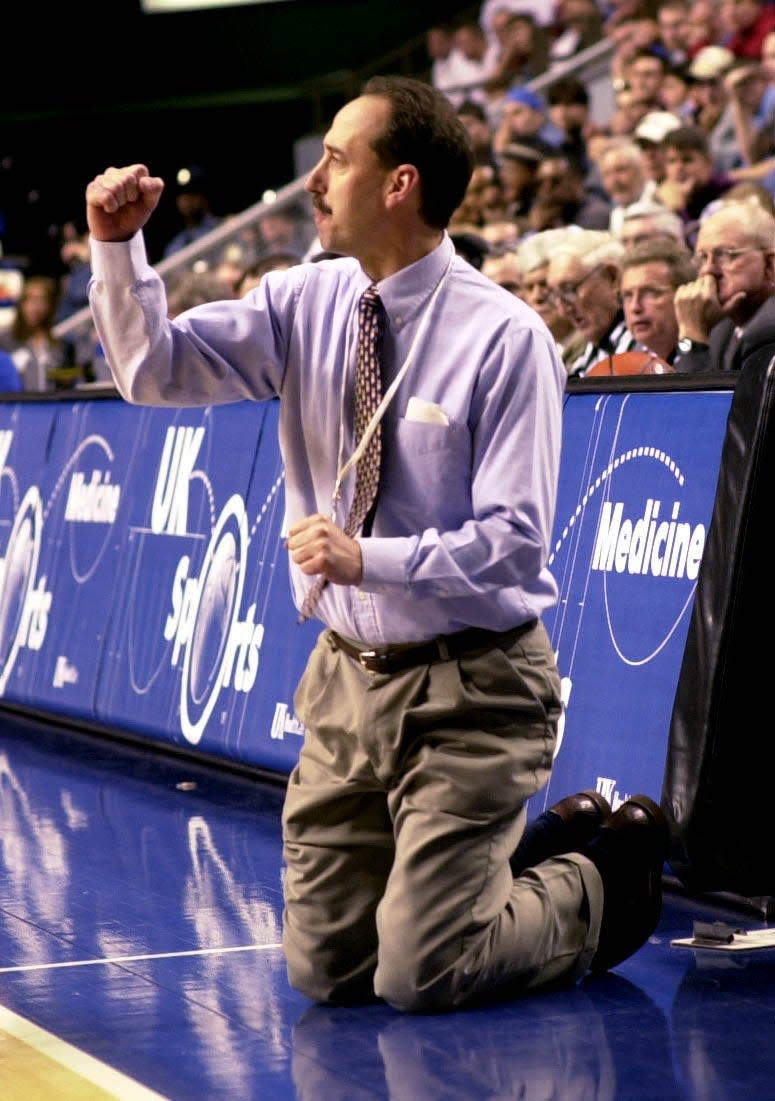Dave Faust cheers on his team in the 2003 state tournament.