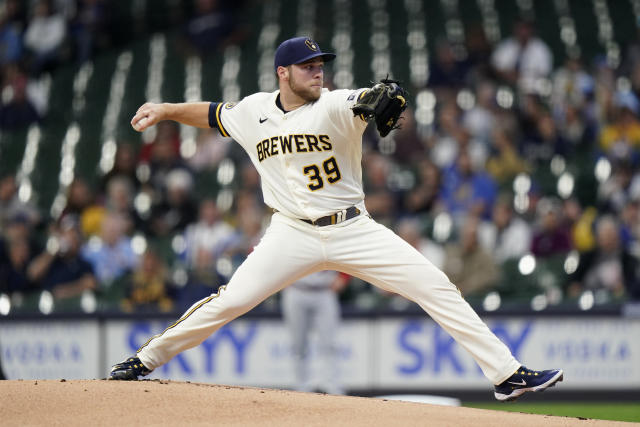 Brewers' Adrian Houser leaves game with elbow soreness