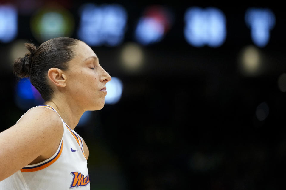 Phoenix Mercury guard Diana Taurasi closes her eyes during the second half of the team's WNBA basketball game against the Seattle Storm, Tuesday, June 4, 2024, in Seattle. The Storm won 80-62. (AP Photo/Lindsey Wasson)