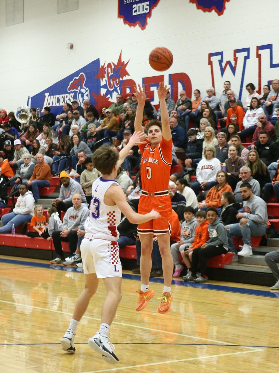 Heath's Preston DeVito shoots a 3-pointer against Lakewood on Friday.