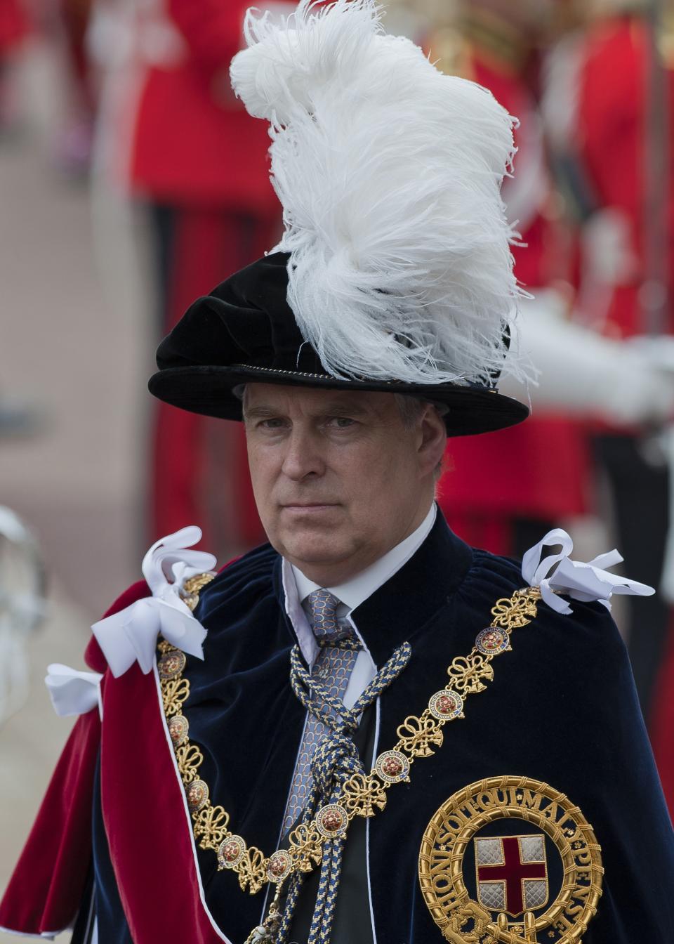 LONDON - JUNE 17: Prince Andrew, Duke of York joins members of the royal family and Knights Garter for the annual service in the annual Garter Ceremony at Windsor Castle on June 17, 2013 in Windsor, England. (Photo by Will Oliver - WPA Pool/Getty Images)