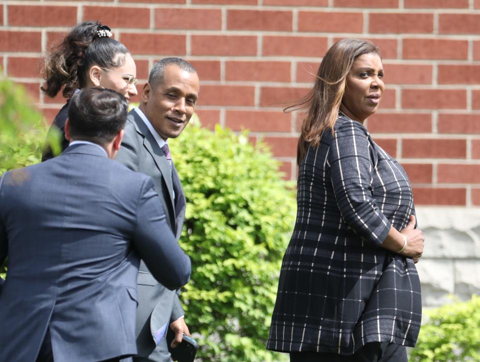 State Attorney General Letitia James, right, joins family, friends and law enforcement from across the state arrive for the funeral services for Aaron W. Salter Jr. at the Chapel at Cross Point Wednesday, May 25, 2022 in Getzville.  Salter was killed during a mass shooting at a Buffalo area Tops grocery a week ago. 
