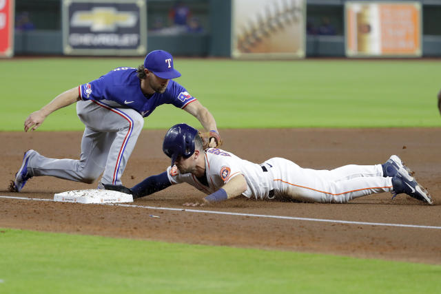 Rangers build big early lead off Valdez, hold on for 5-4 win over Astros to  take 2-0 lead in ALCS – KXAN Austin
