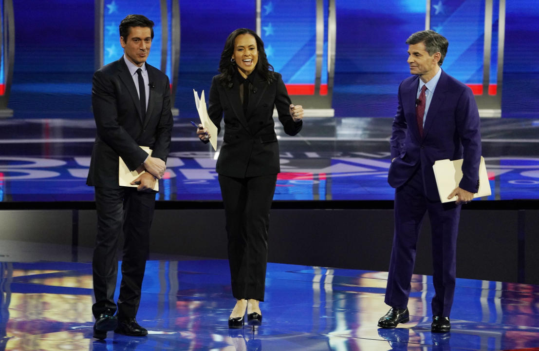 Moderators (R to L) ABC Chief Anchor George Stephanopoulos, ABC World News Tonight Anchor and Managing Editor David Muir and ABC News Live Anchor Linsey Davis speak to the audience before the eighth Democratic 2020 presidential debate at Saint Anselm College in Manchester, New Hampshire, U.S., February 7, 2020. REUTERS/Brian Snyder