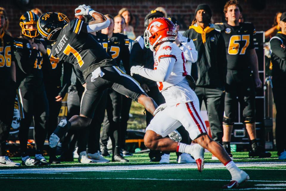 Missouri wide receiver Dominic Lovett snags a pass against the Arkansas Razorbacks on Nov. 25, 2022, in Columbia, Mo.