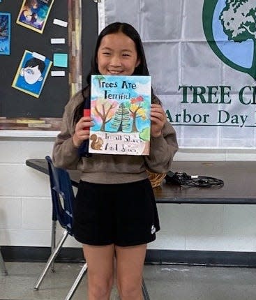 Emma Wei, a fifth grader at Granville Intermediate School, won first place in an annual poster contest centered around Arbor Day.