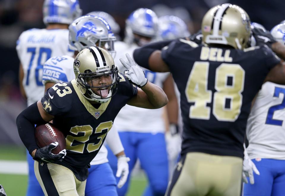 Marshon Lattimore celebrates his interception return for a TD in the second half against the Lions, Oct. 15, 2017 in New Orleans.