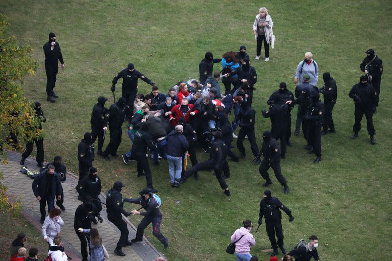 Belarusian opposition supporters hold a rally in Minsk