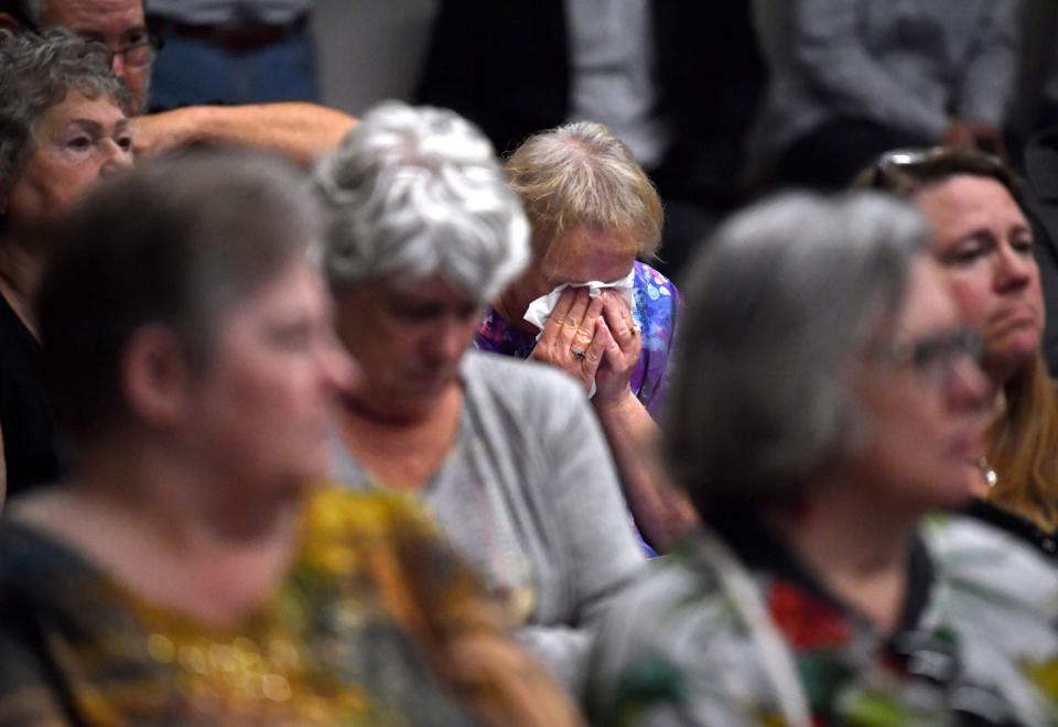 After describing to the Abilene City Council how a prospective grandchild had been aborted, Theresa Jarocki cries into a tissue during a meeting April 28. The council was addressing a proposed ordinance to make Abilene a "sanctuary city for the unborn."